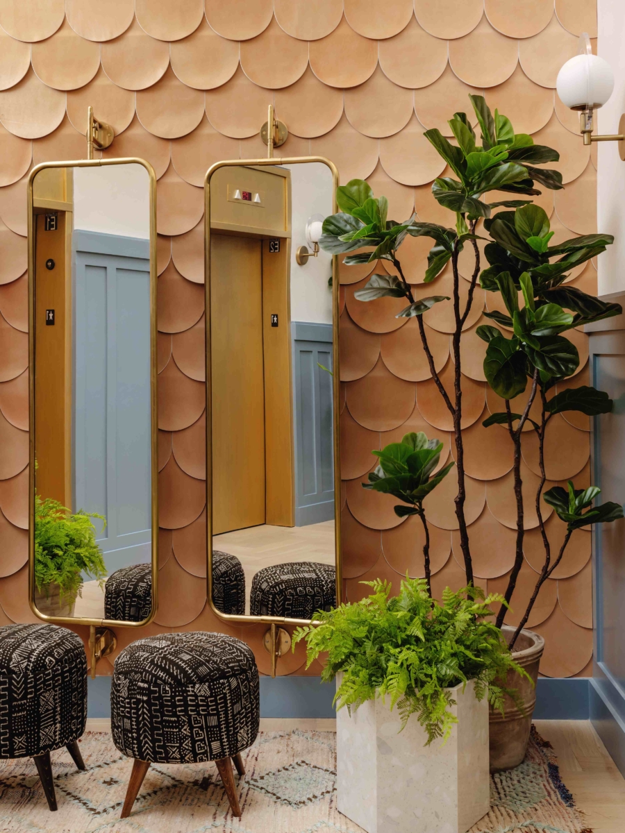 elevator lobby, scalloped design detail and mirrors